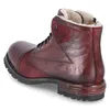 A single burgundy leather boot with shearling lining is shown from a side angle against a white background. Produktbild-Vorschau