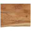 A close-up view of a wooden shelf with a live edge. Náhled obrázku produktu