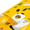 A close-up view of an open advent calendar with a small white pouch featuring the BVB logo. Produktbild-Vorschau