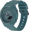 A teal Casio G-Shock watch is shown from a diagonal angle, with the strap extending to the right. Produktbild-Vorschau