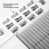 A collection of pleated blind components and fabric samples arranged on a white background. Produktbild-Vorschau
