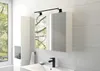 A modern bathroom with a white tiled wall, a medicine cabinet with a mirror, a sink, and a faucet. Produktbild-Vorschau