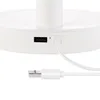 Close-up of a white electronic device with a USB port and a connected charging cable. Anteprima dell’immagine prodotto