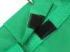 A close-up view of green fabric with black velcro fasteners and green straps. Náhľad obrázku produktu