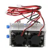 A close-up, studio shot of a dual-fan thermoelectric cooling module with attached wiring. Podgląd zdjęcia produktu