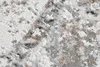 A close-up view of a rug with a vintage-inspired pattern. Produktbild-Vorschau