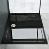 A black rectangular shower tray with a silver drain is shown in a modern bathroom setting. Produktbild-Vorschau