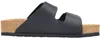 Das Bild zeigt einen schwarzen flachen Schuh der von der Seite betrachtet wird. Der Schuh hat eine schlichte und elegante Form mit einem runden Zehenbereich und einem flachen Absatz. Produktbild-Vorschau