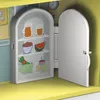 A toy refrigerator with food items inside. Náhľad obrázku produktu