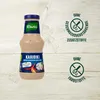 A bottle of Knorr Karibik sauce is shown against a light wooden background, with marketing icons on the right. Produktbild-Vorschau