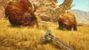 A player character in a video game is fighting two large, furry monsters in a grassy field with rocky cliffs in the background. Anteprima dell’immagine prodotto
