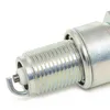 A close-up, detailed view of the tip of a spark plug. Produktbild-Vorschau