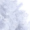 A close-up view of the branches of a white artificial Christmas tree. Produktbild-Vorschau