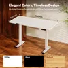 A white standing desk is shown in a room with wooden walls and floor, with three color options displayed at the bottom. Produktbild-Vorschau