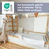 A child's bed with a giraffe stuffed animal and decorative bunting. Produktbild-Vorschau