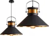 Two views of a black and gold pendant light. Náhled obrázku produktu