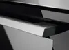 A close-up view of a brushed metal handle on a dark appliance, likely an oven or dishwasher. Náhľad obrázku produktu