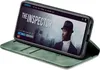 A smartphone case is displayed in an open position, showcasing a movie playing on the phone screen. Produktbild-Vorschau