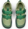 A top-down view of a pair of children's shoes. Produktbild-Vorschau