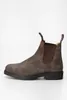 A side view of a brown leather Blundstone boot against a white background. Produktbild-Vorschau