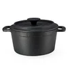 A black cast iron pot with a lid and handles, shown from a side angle against a white background. Anteprima dell’immagine prodotto