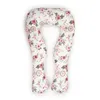 A U-shaped pregnancy pillow with a floral and dreamcatcher pattern, laid out flat on a white background. Anteprima dell’immagine prodotto