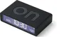 A black digital alarm clock with a blue display and the word 'on' on its surface. Náhled obrázku produktu