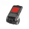 A black and silver dashcam with a red adhesive pad on top, isolated on a white background. Produktbild-Vorschau