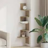 A corner shelf unit with decorative items and books is mounted on a white wall next to a sofa and a large potted plant. Náhled obrázku produktu
