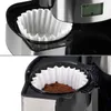 Close-up views of a coffee maker's filter basket with a paper coffee filter. Produktbild-Vorschau
