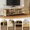 A TV cabinet with multiple compartments and drawers, shown in a living room setting with a TV on top. The image is a collage with close-up shots highlighting specific features. Produktbild-Vorschau