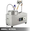 A gemstone faceting machine with a water pump and mechanical grip, shown on a white background. Anteprima dell’immagine prodotto