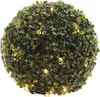A close-up, studio shot of a decorative LED-lit artificial boxwood ball. Produktbild-Vorschau