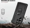 A black phone case with a ring holder is shown in a dynamic, action-oriented scene, with debris flying around it, suggesting durability and protection. Produktbild-Vorschau