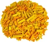 A pile of assorted LEGO bricks in yellow and orange hues. Produktbild-Vorschau