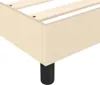 A close-up view of the corner of a bed frame, showing the fabric upholstery and a black leg. Produktbild-Vorschau