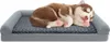 A husky puppy sleeping on a dog bed. Voir les images du produit