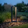 A modern outdoor lamp illuminates a garden path at dusk. Náhľad obrázku produktu