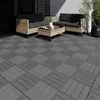 Outdoor patio with wicker furniture and decking tiles. Náhled obrázku produktu