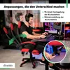 A man is sitting in a gaming chair and using a computer. The chair is red and black. Náhľad obrázku produktu