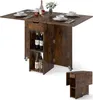 A foldable dining table with storage, shown with one leaf extended and doors open, displaying bottles of wine on shelves. A smaller, folded view of the table is in the bottom right corner. Náhľad obrázku produktu