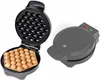 A split image showing an open bubble waffle maker with waffles inside on the left, and a closed bubble waffle maker on the right. Náhľad obrázku produktu