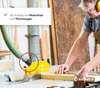 A man is using a table saw with a dust collection hose attached. Produktbild-Vorschau