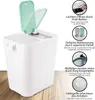 A white dual-compartment trash can with mint green lids, shown on a wooden surface, with feature callouts and text descriptions. Produktbild-Vorschau