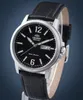 A close-up studio shot of an Orient men's watch with a black dial and black leather strap. Voir les images du produit