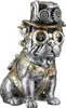 A steampunk-styled decorative figurine of a bulldog wearing a hat and goggles. Anteprima dell’immagine prodotto