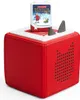 A red Toniebox audio player with a Tonie story figure on top, set against a white background. Produktbild-Vorschau
