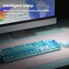 A computer keyboard and mouse set is displayed on a desk in front of a computer monitor. Produktbild-Vorschau