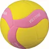A close-up studio shot of a yellow and pink volleyball. Produktbild-Vorschau