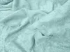 A close-up view of a crumpled mint-colored terry cloth sheet. Náhled obrázku produktu